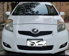 vitz model 9 12 Lahore Lifetime fresh condition only call