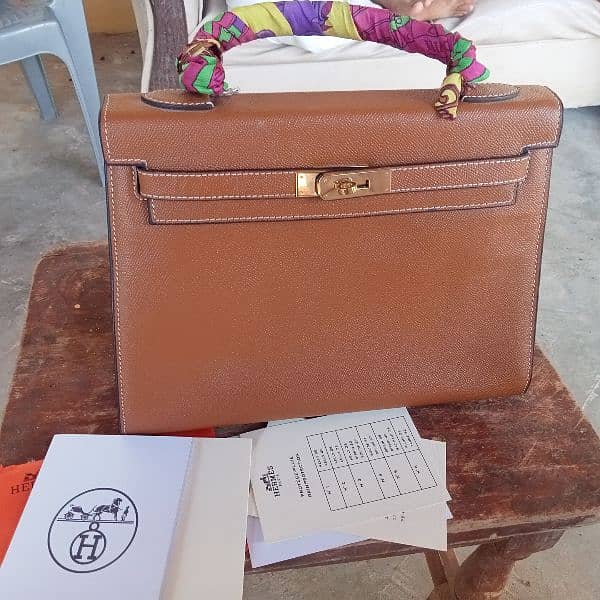 hermes bag price 40lac price can be  reduce  on table  talk 2