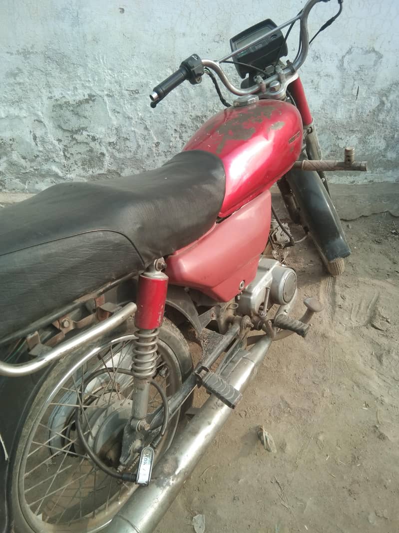 United 70 cc model 2015 Lahore number book file available urgent sale 2