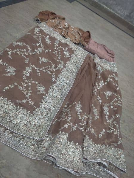 URGENT SALE. . . Brown Embroidered organza net Saree one time use only 7