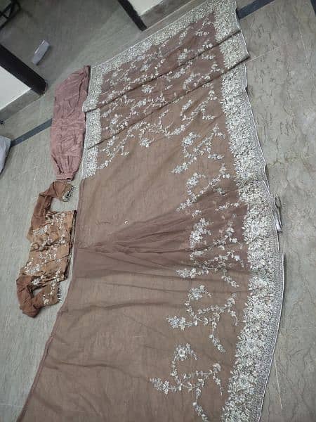 URGENT SALE. . . Brown Embroidered organza net Saree one time use only 14