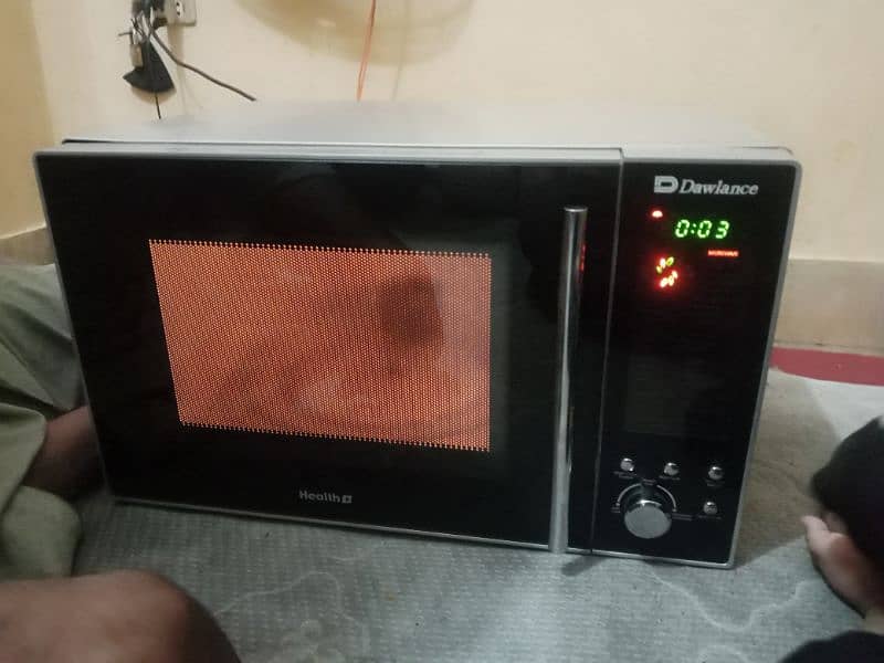 like new big size microwave Dawlance with LCD panal 9