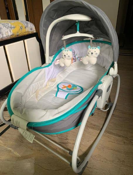 Mastella 5 in 1 rocker bassinet. . . 

With music and mosquito net. . 3