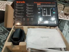 Tenda Router 1 month use. . along with full pack original charger/wire/