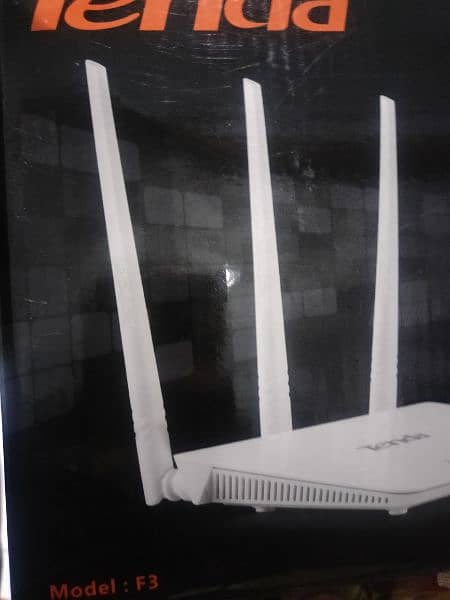 Tenda Router 1 month use. . along with full pack original charger/wire/ 4