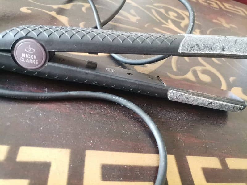 Nicky Clarke's professional hair straightener imported quality. 1