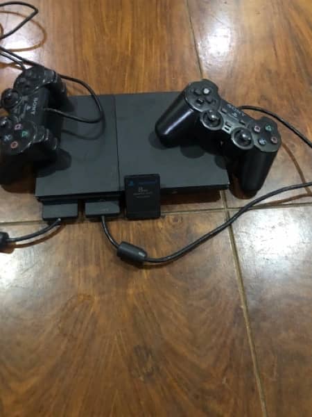 PlayStation 2 With 2 Controllers 1