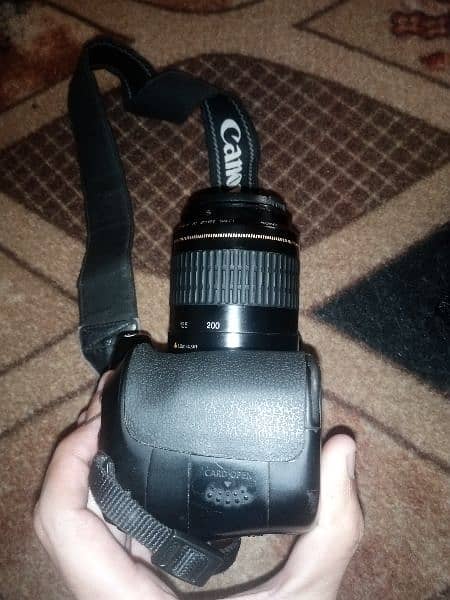Canon D60 camera condition 8/10 with 80-200  one hand use 1