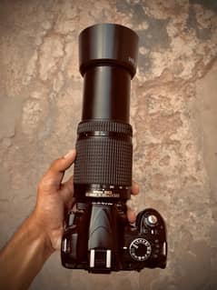 Nikon D3100 with  70-300mm manual Lens with other accessories