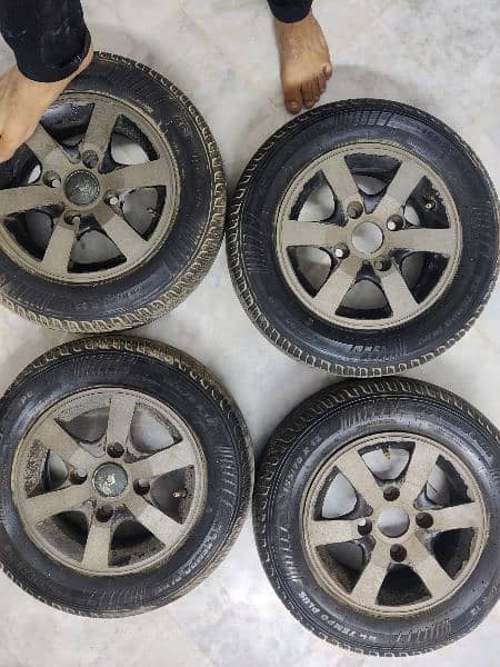 12 Inch Alloy Rims with General Tubeless Tires 155/70 Set of 4 0
