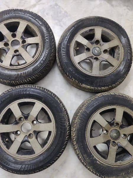 12 Inch Alloy Rims with General Tubeless Tires 155/70 Set of 4 1