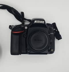 Nikon D610 with battery, charger and bag.