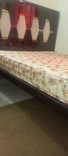 iron bed in very good condition just like new with spring mattress
