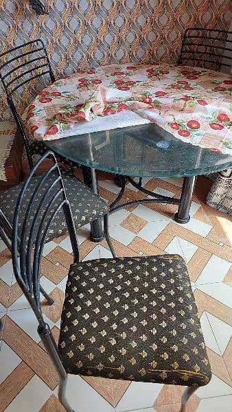 Glass dinning table with 4 chairs 1