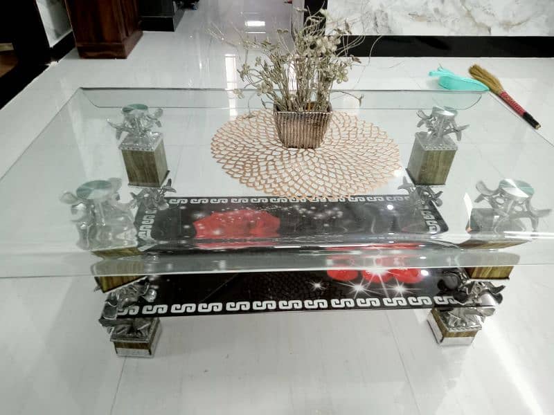 glass top center table . . slightly used 9/10 condition 2
