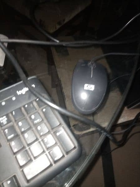 Company of monitor is Dell. Mouse and CPU are 'HP' Keyboard is Logitech 9
