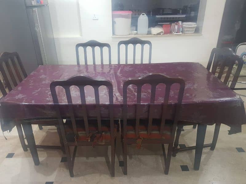 wooden dining table. 1