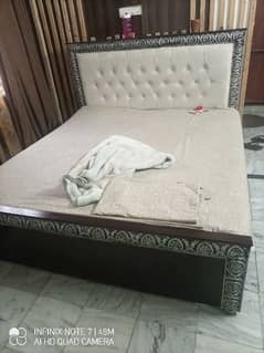 Wooden bed paded back 0
