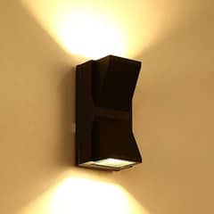 Two way indoor/outdoor wall light