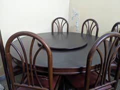 pure wooden dining table and 6 chairs