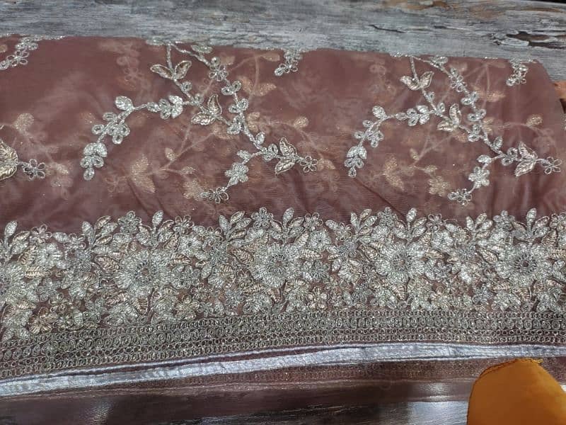 URGENT SALE. . . Brown Embroidered organza net Saree one time use only 15