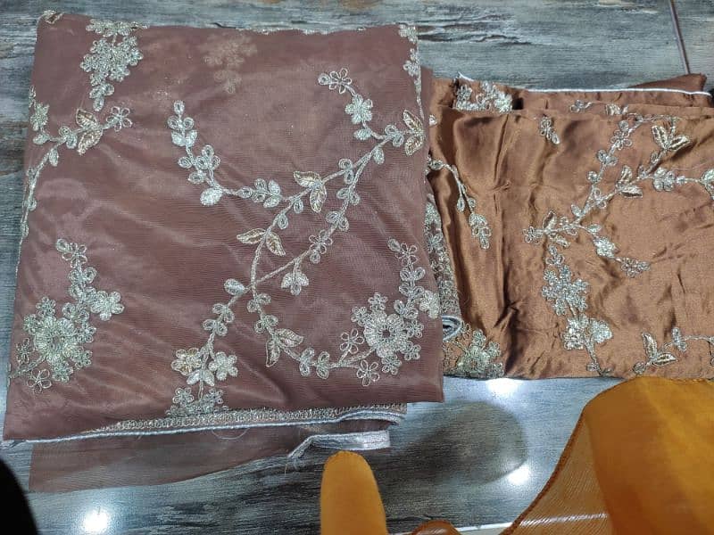 URGENT SALE. . . Brown Embroidered organza net Saree one time use only 16