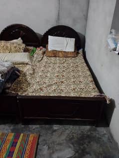 2 Single wooden beds in good condition