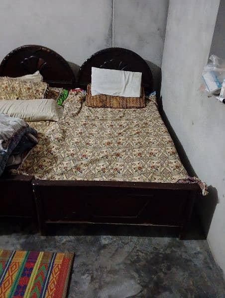 2 Single wooden beds in good condition 0