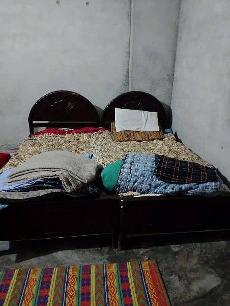 2 Single wooden beds in good condition 4