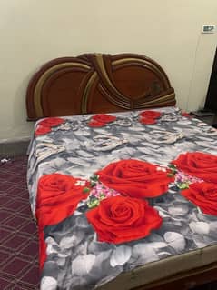 Double size bed with side tables