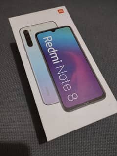 Xiaomi Redmi Note 8 phone with original charger and box