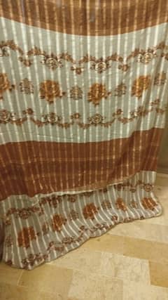 brown and off white curtain 0