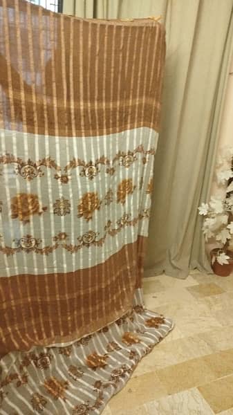 brown and off white curtain 1