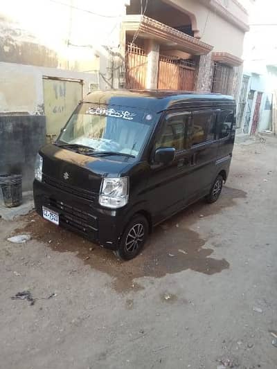 Avery 7 seater black color fully Ac.  Available in Karachi