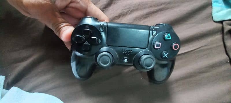 playstation 4 controller with trackpad . 4