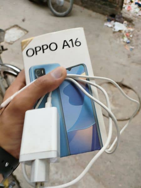 oppo A 16 like new condition 4.64 box with charger 5
