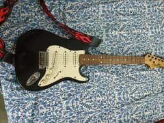 Electric guitar + pocket amplifier