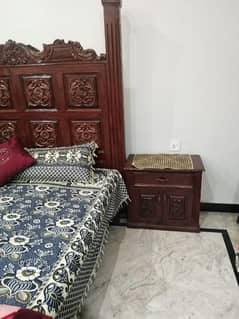 Bed with dressing table