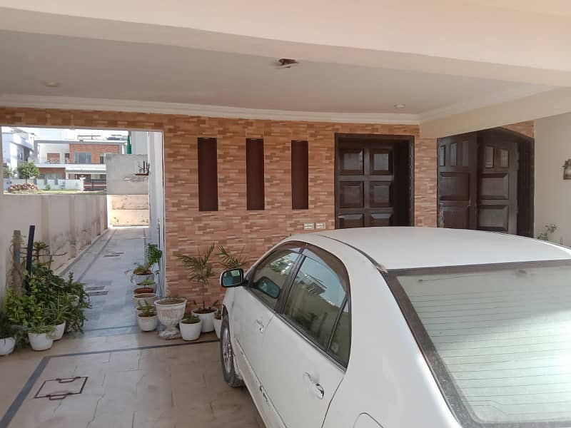 Bahria Town Phase 8, Overseas Block 1 Kanal Marla Designer House Perfectly Constructed Outstanding Location Near To Masjid Park School And Commercial Are 1