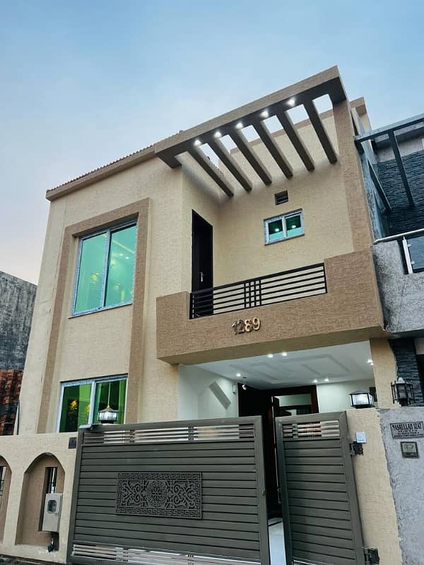 Bahria Town Phase 8, 5 Marla Brand New House Available, Ali Block, 4 Beds With Attached Baths Bath Tub Installed It's Designer House On Investor Rate 1