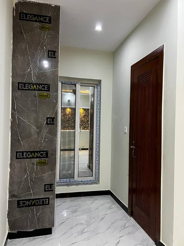 Bahria Town Phase 8, 5 Marla Brand New House Available, Ali Block, 4 Beds With Attached Baths Bath Tub Installed It's Designer House On Investor Rate 16