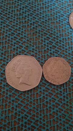 1997 50 pence elizabeth coin and 2008 20 pence elizabeth