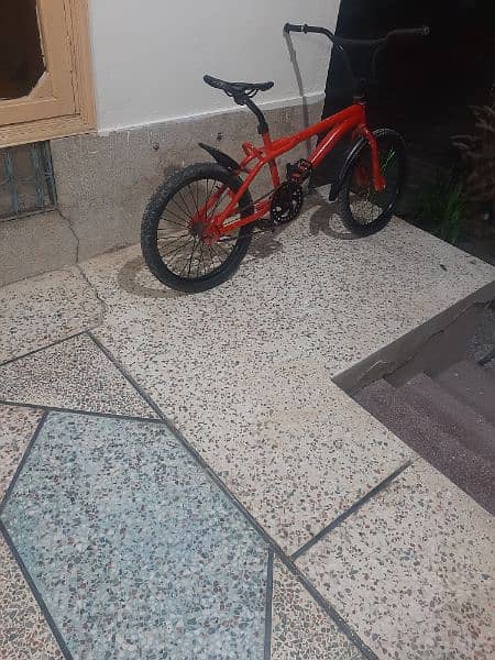 bmx cycle full ment codition red color and black tyres 1