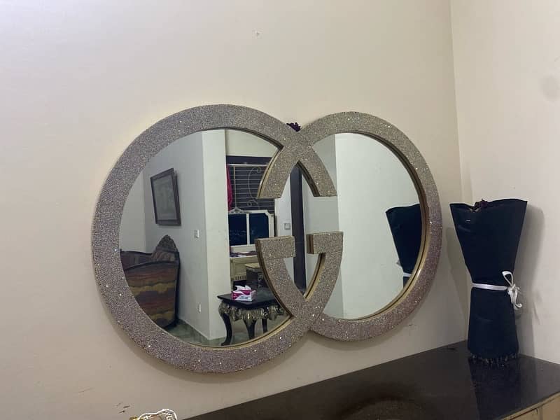 console table with mirror for sale. a little coor faded from one side. 0