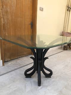 Dining table with heavy glass top