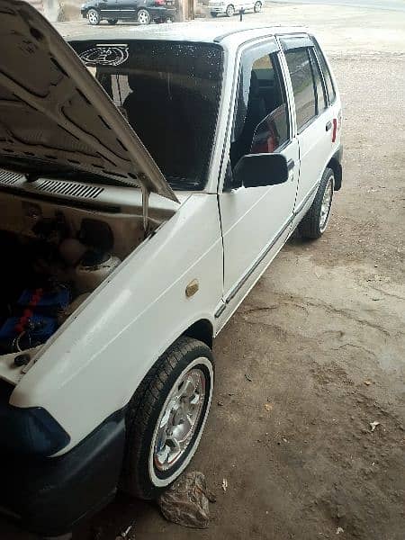 Mehran car 2006 model white color Rawalpindi registered 8