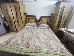 Bed with cupboards and mattress