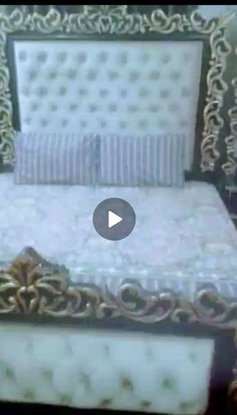 king bed with side table with attached long mirrors and one dressing 1