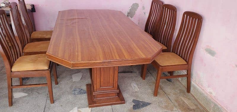Wooden 6 seater dining table with 6 chairs. 1