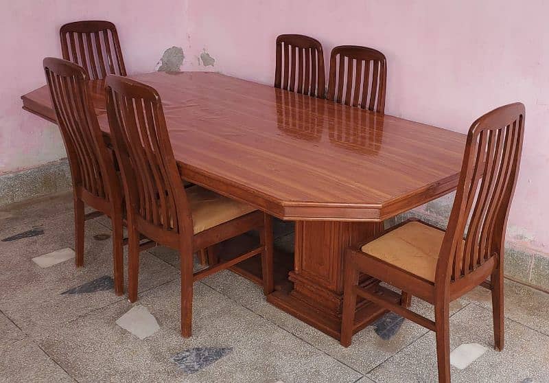 Wooden 8 seater dining table with 6 chairs. 2